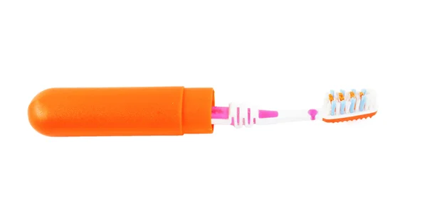 Зубная щётка в открытой оранжевой коробке — стоковое фото