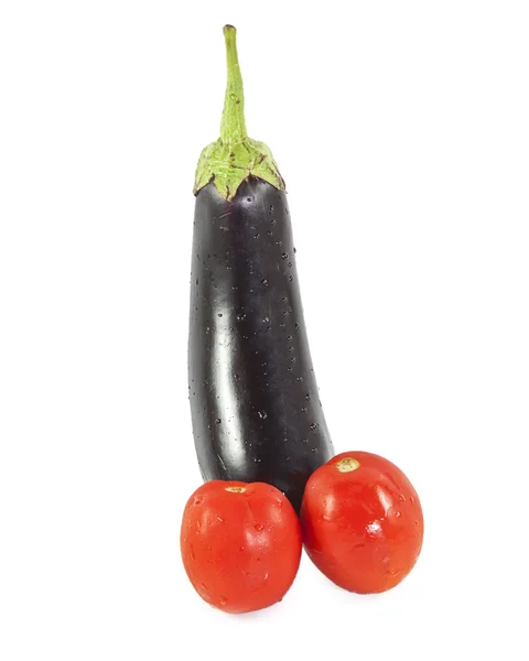 Una berenjena y dos tomates —  Fotos de Stock