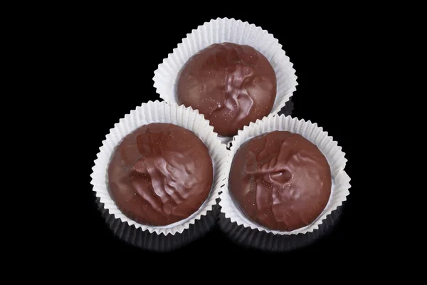 Drie chocolade snoepjes — Stockfoto