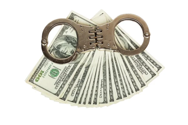 Stack of money and handcuffs — Stock Photo, Image