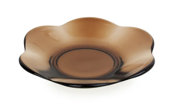 Beautiful saucer of clear brown glass — Stock Photo, Image