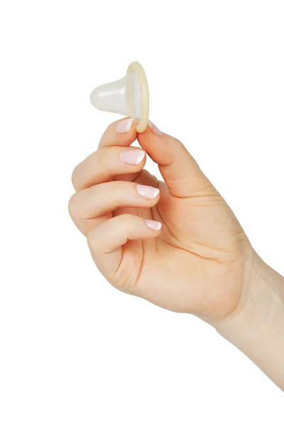 Female hand holding condom — Stock Photo, Image