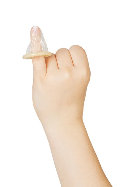 Жіноча рука тримає презерватив — стокове фото