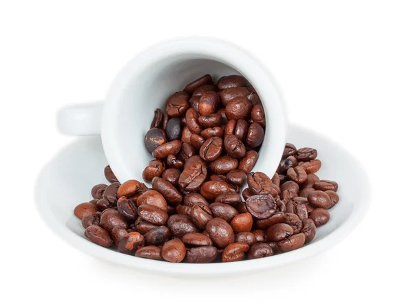 Cangkir terbalik dengan biji kopi — Stok Foto