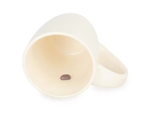 Koffie bonen in beige cup — Stockfoto