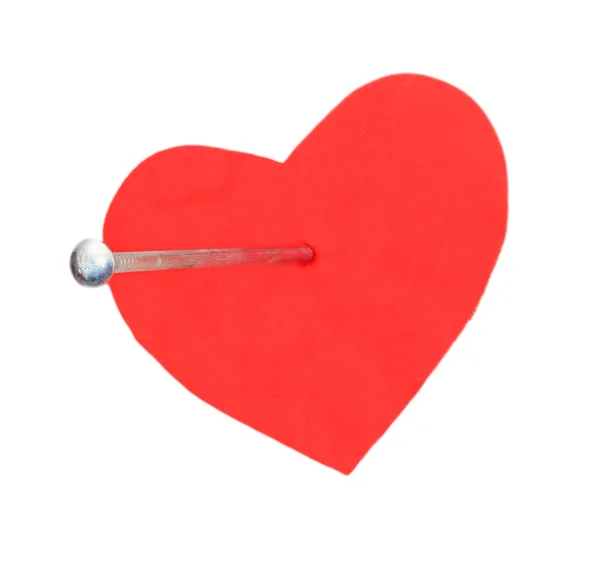 Hobnail in a red heart — Stock Photo, Image