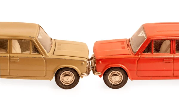 Dois modelos de carro de brinquedo para crianças colidiram pára-choques — Fotografia de Stock