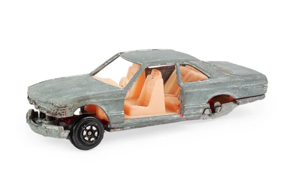 Broken gray children's toy car model — Stock Photo, Image