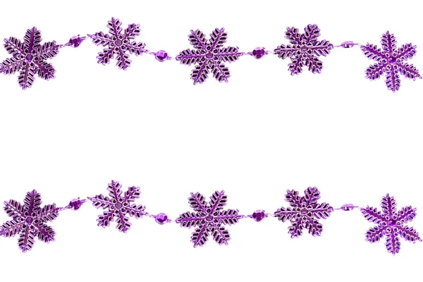 Copos de nieve púrpura plástico — Foto de Stock