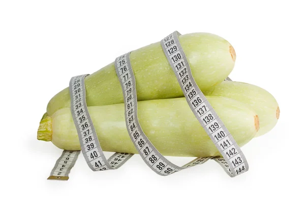 Three zucchini with white measuring tape — Stock Photo, Image