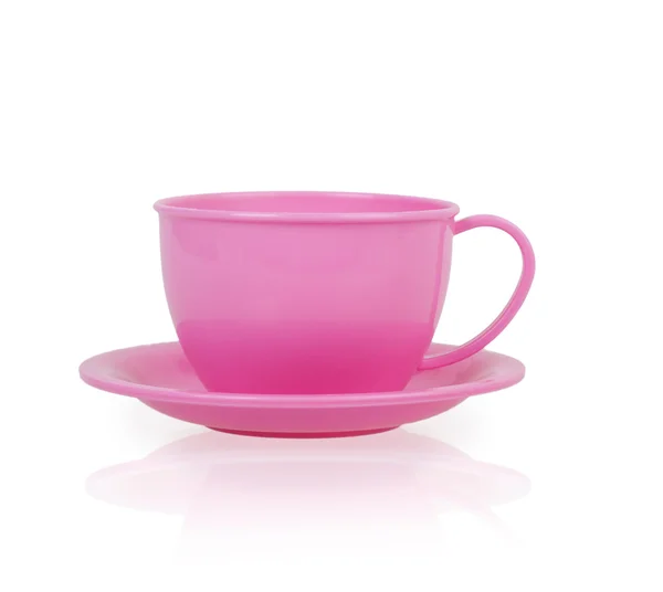 Pink plastic toy cup and saucer — Stock Photo, Image