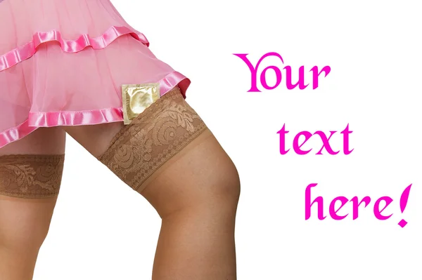 Condom in female stockings — Stock Photo, Image