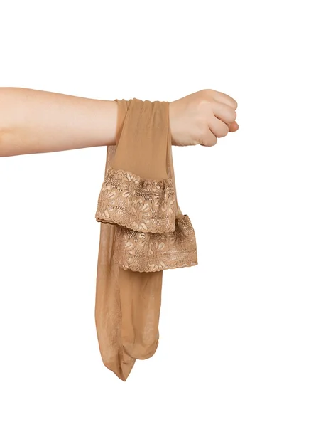 Stockings hanging on a female hand — Stock Photo, Image