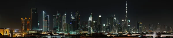 Дубай. світ торговий центр і Бурдж Халіфа вночі — стокове фото