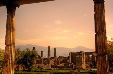 Ruins in Pompeii and in background Vesuvius, Italy clipart