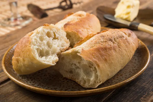 Pão e manteiga franceses — Fotografia de Stock