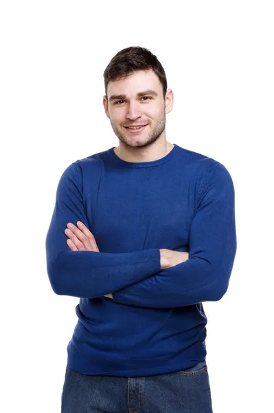 Knappe man draagt een blauwe trui geïsoleerd op wit — Stockfoto