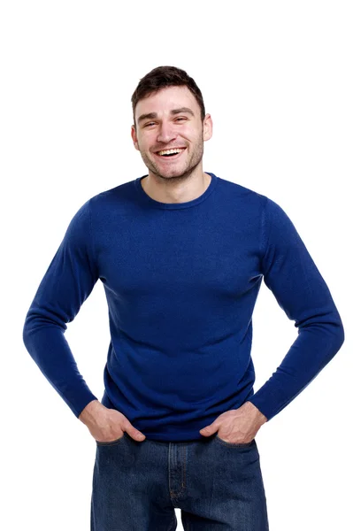 Bonito homem vestindo uma camisola azul isolado no branco — Fotografia de Stock