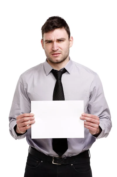 Business man looking confused holding a blank sign — Stock Photo, Image