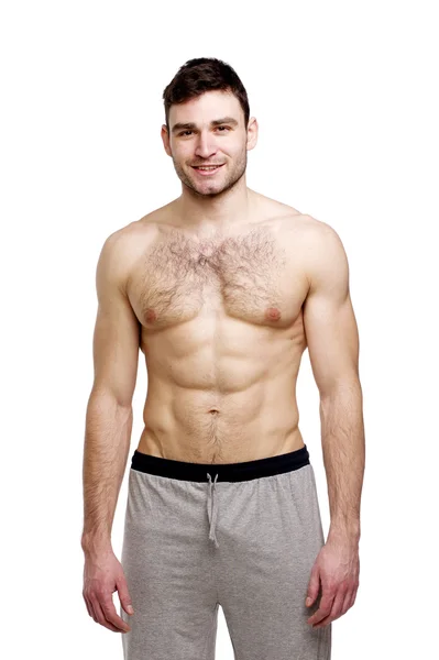 Topless man stood isolated on a white background — Stock Photo, Image