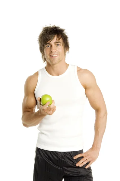 Man holding an apple isolated on a white background — Stock Photo, Image