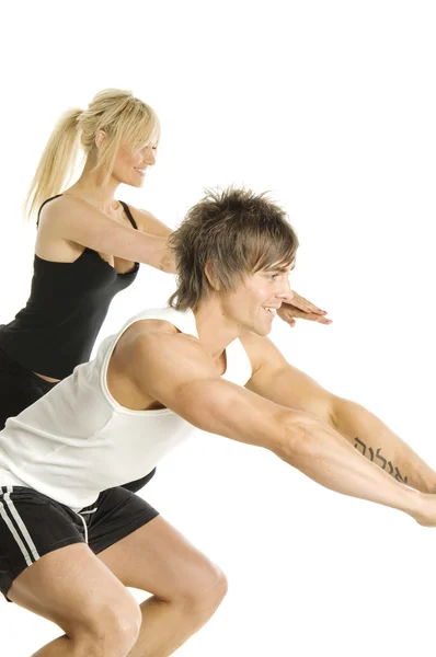 Man and woman working out isolated on a white background — Stock Photo, Image