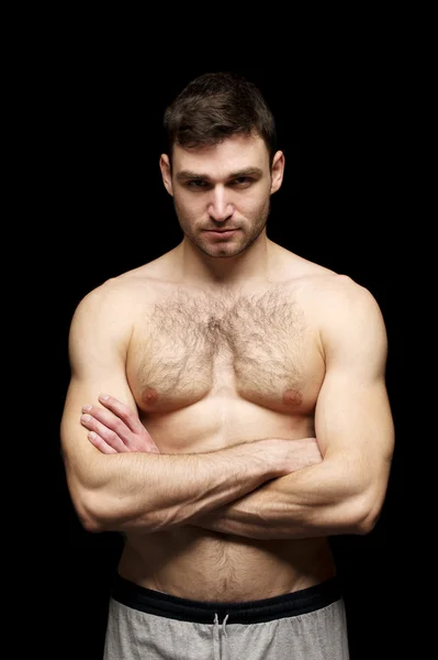 Topless man stood with his arms folded — Stock Image Topless man stood with his arms folded Stock Photo