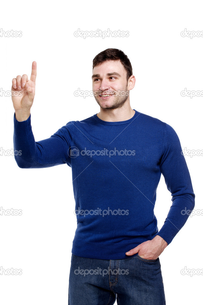 Smiling man pointing, isolated on a white background