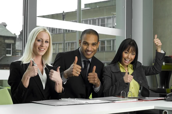 Arbeitskollegen glücklich im Meeting — Stockfoto