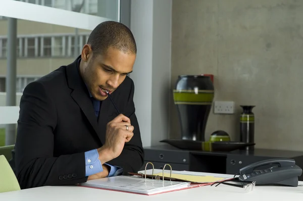 Business man doing paper work — Stock Photo, Image