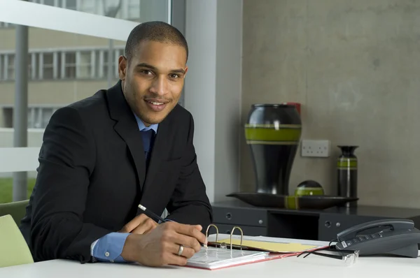 Business man working at his desk — Stock Photo, Image