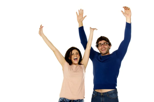 Beautiful couple cheering and celebrating isolated on a white ba — Stock Photo, Image