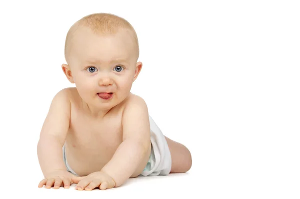 Baby op zijn voorkant geïsoleerd op een witte achtergrond — Stockfoto