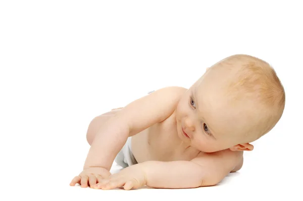Bébé sur son devant isolé sur un fond blanc — Photo