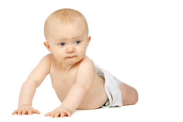 Baby op zijn voorkant geïsoleerd op een witte achtergrond — Stockfoto