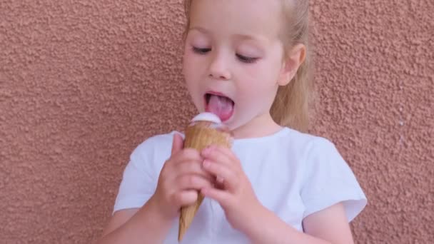 Little Cute Girl White Summer Dress Enjoying Delicious Ice Cream — 图库视频影像