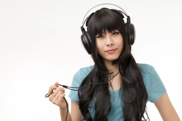 Mujer asiática y auriculares —  Fotos de Stock