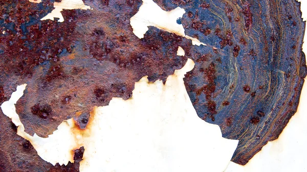 Una pieza oxidada de metal —  Fotos de Stock
