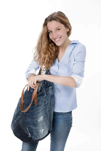 Mladá dívka s taškou — Stock fotografie
