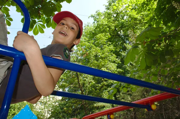 Child on a swing — Stock Photo, Image