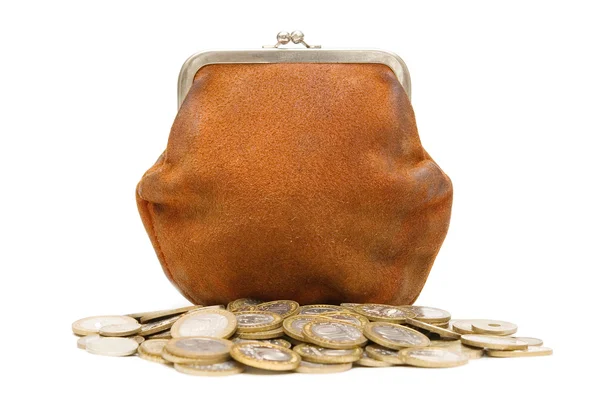 Коричневый кошелек и куча монет — стоковое фото