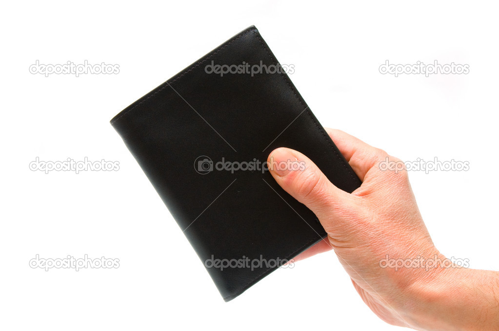 Hand holding black pocketbook
