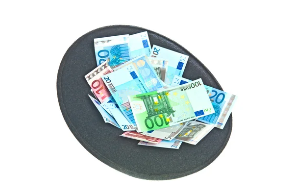Mössa med eurosedlar — Stockfoto