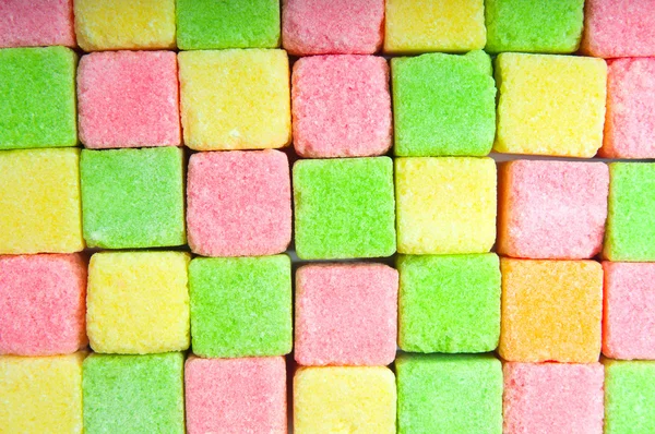 Multicolor sugar lumps background — Stock Photo, Image