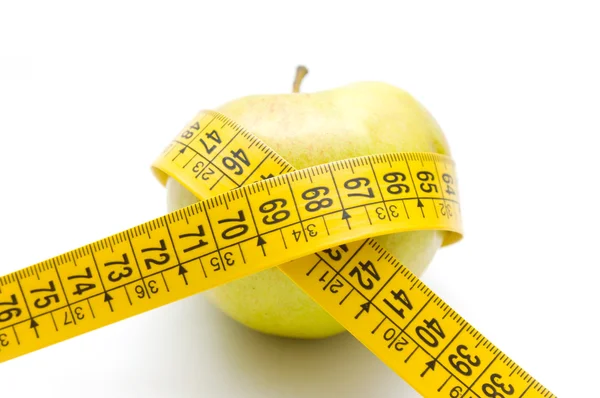 Messung von Apfel und Band — Stockfoto