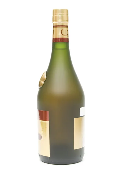Cognacflasche isoliert auf weiß — Stockfoto