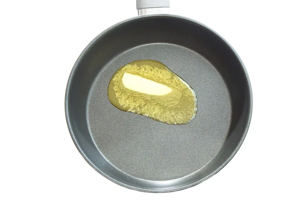 Melted butter on pan — Stock Photo, Image