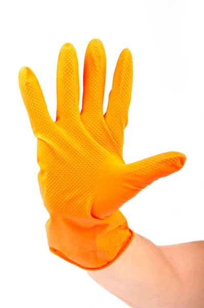 Hand in yellow rubber glove — Stock Photo, Image