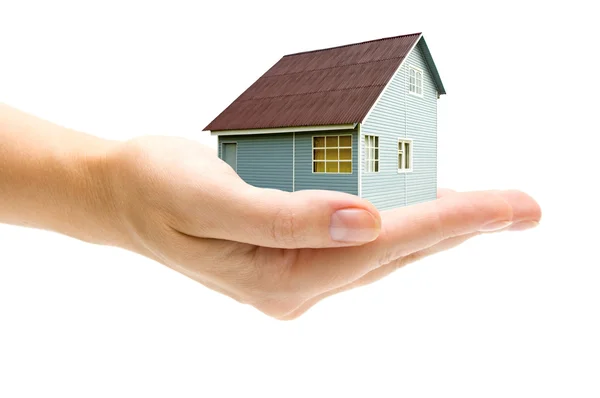 Mano y casa sobre fondo blanco — Foto de Stock