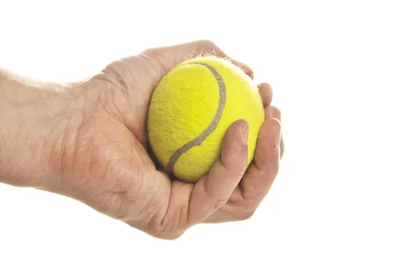 Hand holding tennis ball isolated on white — Stock Photo, Image